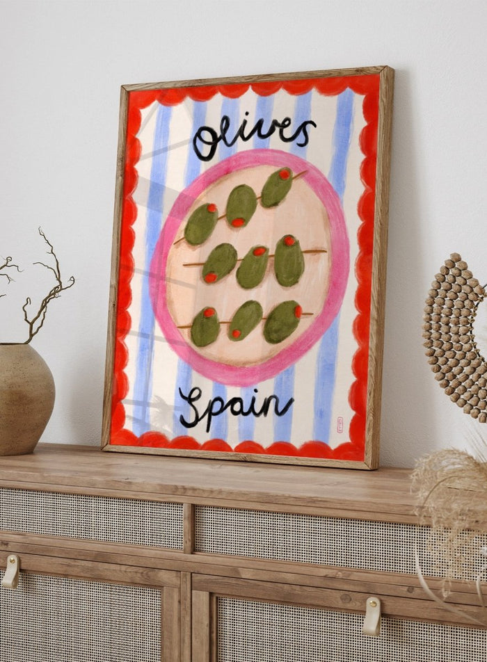 Spanish Olives Plate by Dirkie Nell is a colorful food art print featuring olives, Mediterranean inspired kitchen wall art, striped patterns, and playful modern illustration.