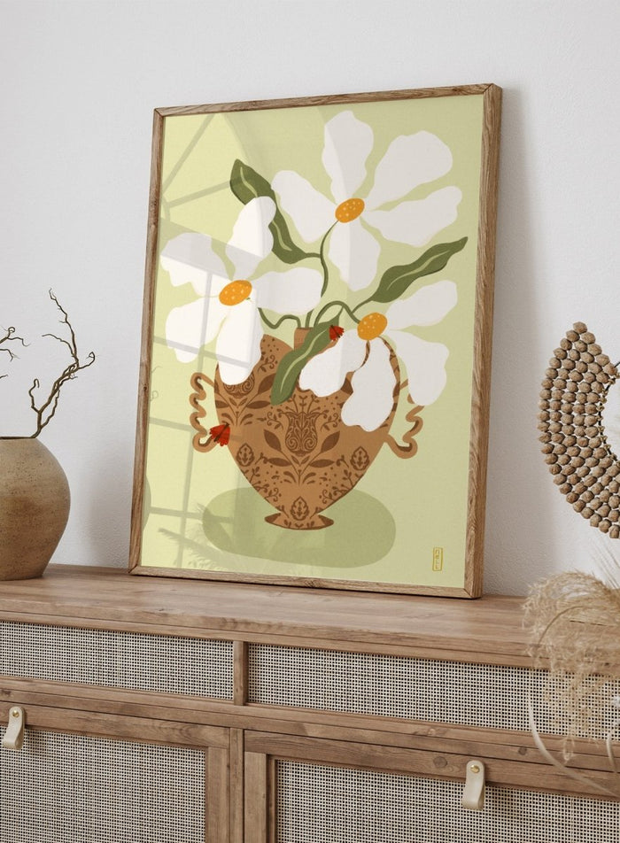 Decorative illustration of a vase with white flowers on a light green background. Whimsical Floral Heart by Dirkie Nell is a floral art print featuring oversized white flowers, a patterned heart vase, and hand painted folk inspired details.