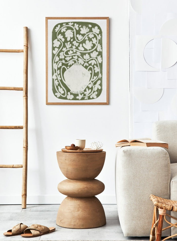 Winding Botanical Vase by Dirkie Nell is a modern folk art print featuring botanical vines, olive green tones, and hand drawn Scandinavian inspired wall art.