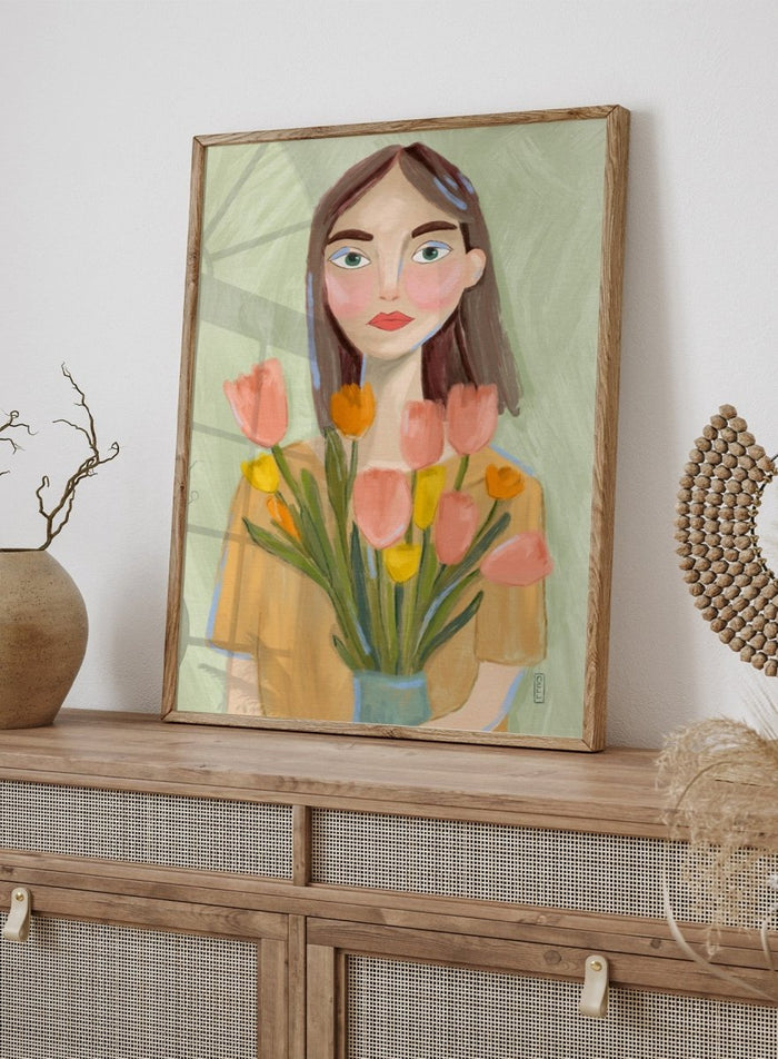 Artistic illustration of a woman holding flowers with a soft, pastel background. Woman with Spring Tulips by Dirkie Nell is a contemporary floral portrait art print featuring hand painted tulips, expressive illustration, and soft spring colors.