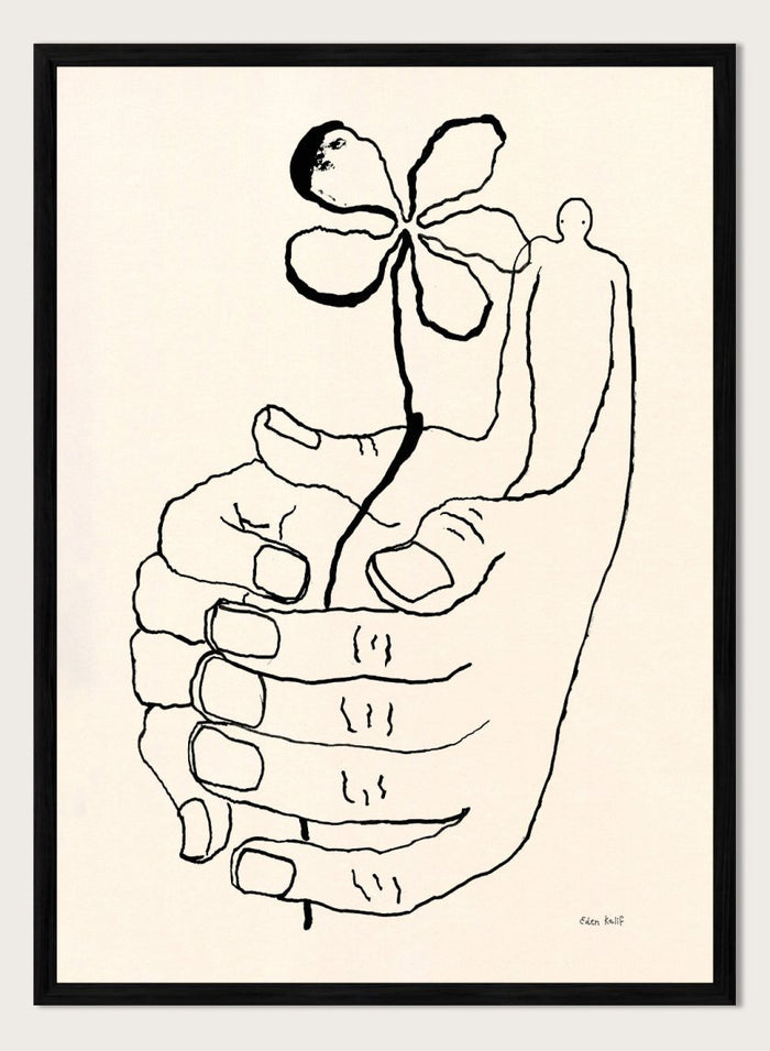 Black line drawing of a hand holding a flower on a beige background. Let It Grow by Eden Kalif is a modern line art print featuring a hand holding a flower with a human figure, designed as a minimalist contemporary wall poster.