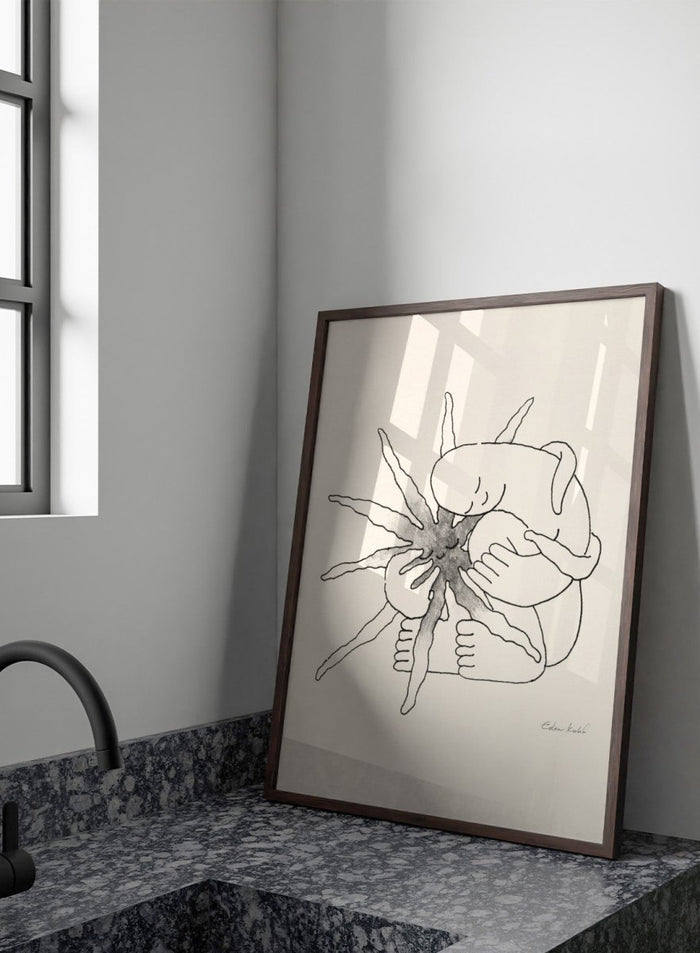 Black and white line art of a person embracing a sun figure on a beige background. Sunshine Love by Eden Kalif is a modern line art print featuring a figure holding a sun in a minimalist contemporary wall poster design.