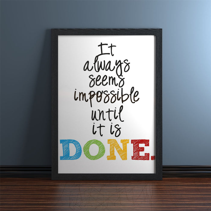 Black picture and poster frame displaying inspiring quote 'It always seems impossible until it is DONE.'