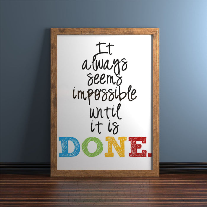 Rustic picture and poster frame showcasing inspirational quote: 'It always seems impossible until it is DONE.'