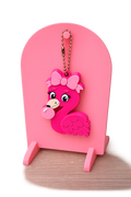 Flamingo with bow can opener