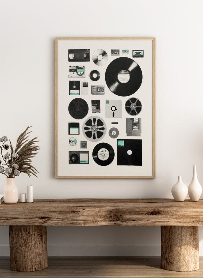 Collection of vintage audio and video equipment on a white background. Analog Digital Memories by Florent Bodart is a retro media art print featuring vinyl, cassette, and floppy disks, a modern wall poster exploring analog and digital design.