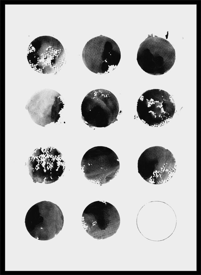 Black and white pattern of circular shapes on a textured background. Fluid Black Circles by Florent Bodart is a minimalist abstract art print with black ink circles, a modern black and white wall poster with graphic grid design.