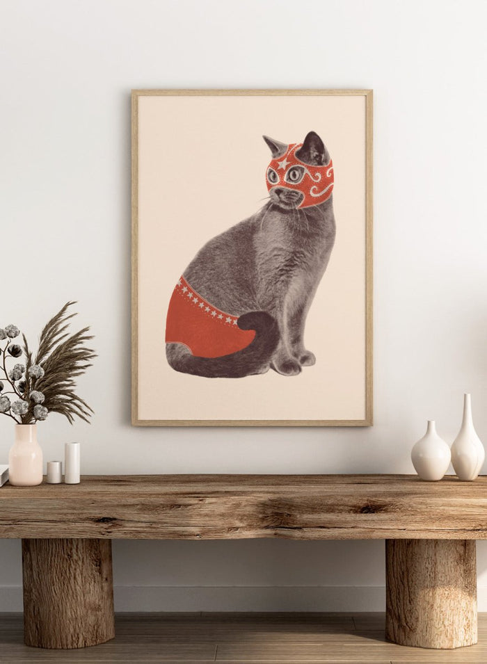 Cat wearing a red mask and underwear on a beige background. Funny Luchador Cat by Florent Bodart is a playful cat art print with bold red mask, a modern wall poster with humorous and surreal animal design.