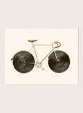 Framed artwork of a bicycle with spiral wheels on a beige background. Sweet Licorice Bicycle by Florent Bodart is a surreal bicycle art print with playful design and vintage style, a modern wall poster with creative and unique concept.