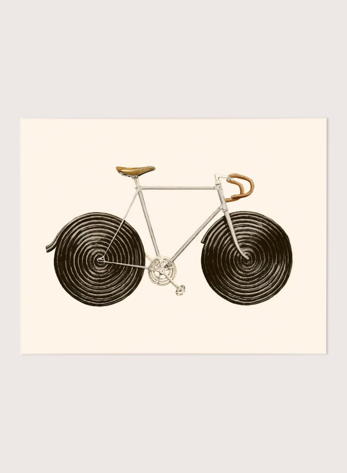 Framed artwork of a bicycle with spiral wheels on a beige background. Sweet Licorice Bicycle by Florent Bodart is a surreal bicycle art print with playful design and vintage style, a modern wall poster with creative and unique concept.