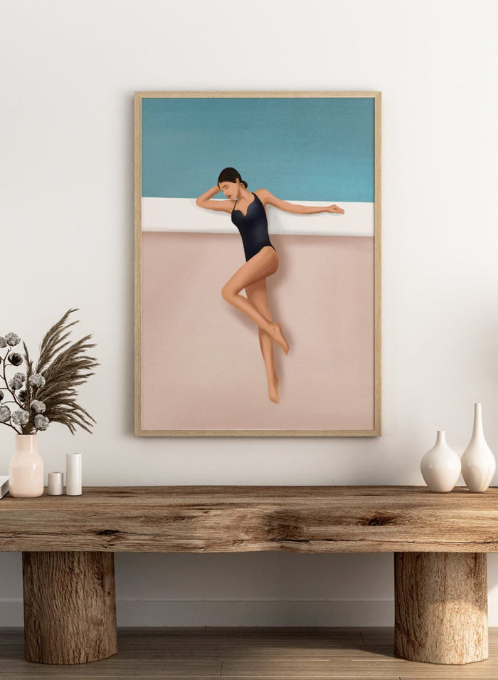 Woman in a black swimsuit lying on a white ledge with a blue background. Chic Poolside Moment by Flow Line features a woman resting beside a pool, bringing modern resort style, coastal wall art, and summer elegance to your home.