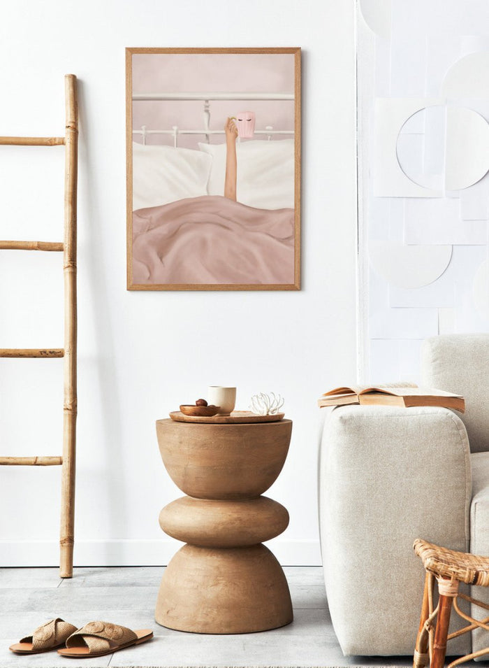 Coffee Cup by Flow Line is a cozy morning art print featuring a woman in bed holding a pink mug. A modern lifestyle wall poster celebrating slow mornings.