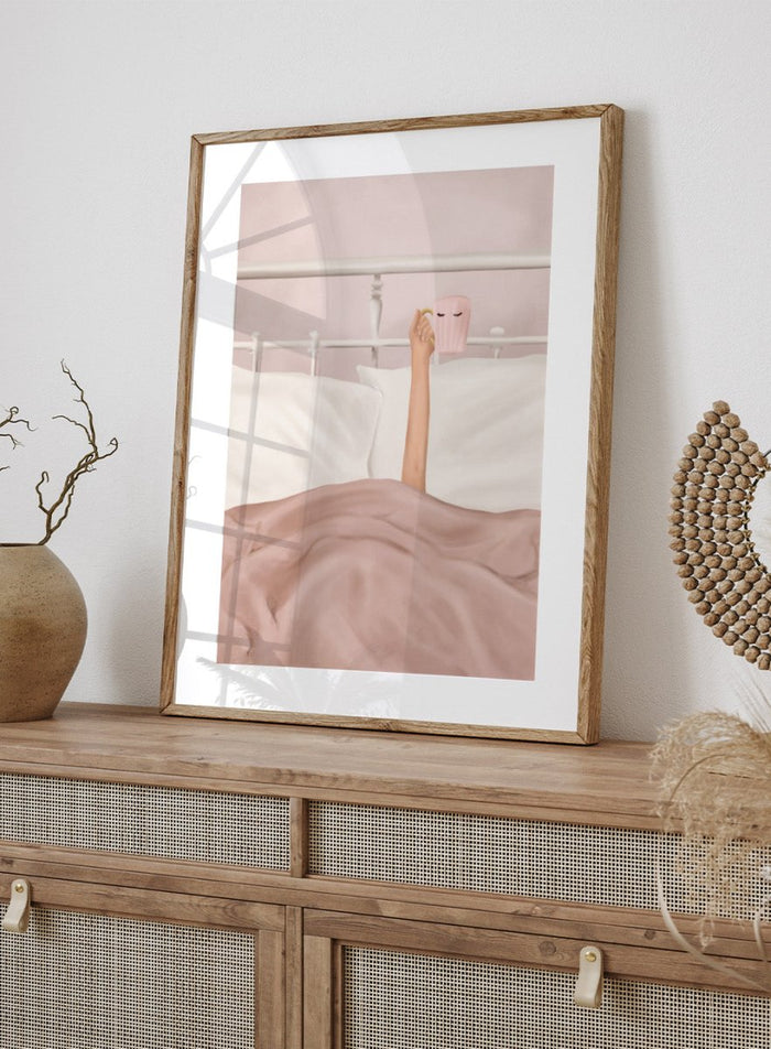 Coffee Cup by Flow Line is a cozy morning art print featuring a woman in bed holding a pink mug. A modern lifestyle wall poster celebrating slow mornings.