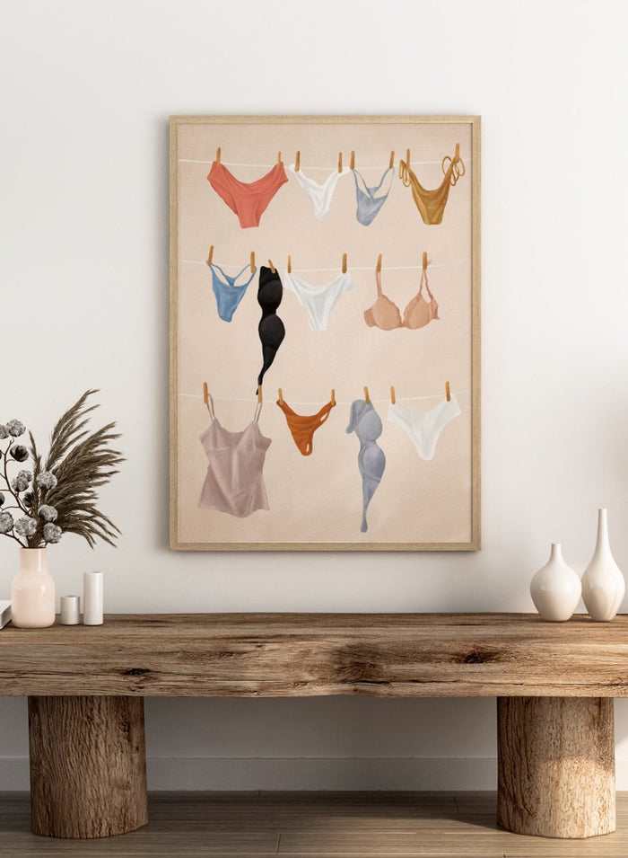 Colorful lingerie hanging on a line against a beige background. Lingerie On The Line by Flow Line is a playful summer art print featuring colorful garments drying in the sun, perfect for bedrooms, dressing rooms, and modern interiors.
