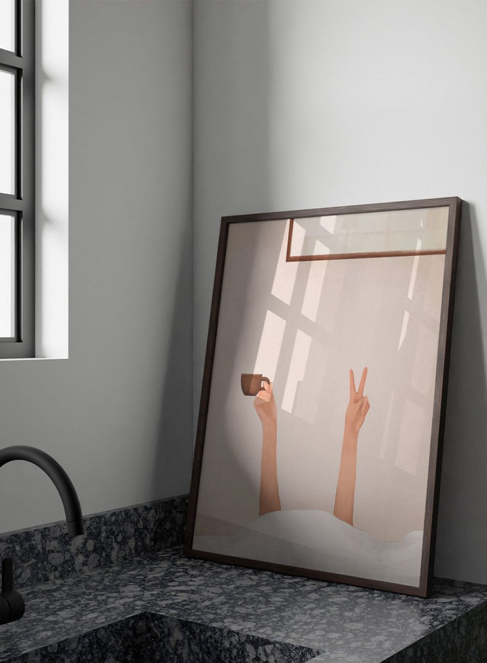 Person holding a cup with one hand and making a peace sign with the other, against a plain wall. Morning Coffee Peace by Flow Line is a playful coffee art print featuring a cozy bed scene, slow mornings, and minimalist bedroom wall art for modern interiors.