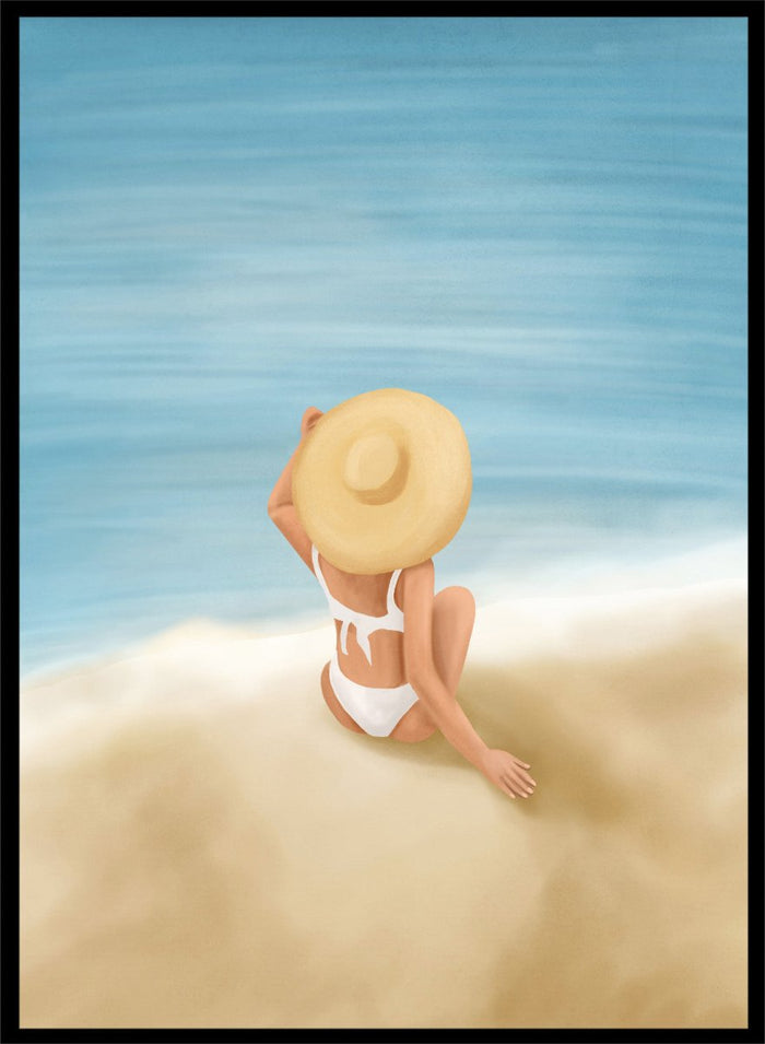 Woman in a white bikini and sun hat sitting on sand looking at ocean. Ocean View Relaxation by Flow Line is a coastal wall art print featuring a woman by the ocean, soft blue tones, beach decor, and relaxed summer style.