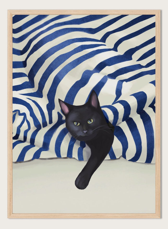 Black cat peeking out from behind a blue and white striped fabric. Peeking Black Cat by Flow Line features a mischievous black cat among striped cushions, adding playful cat art and modern coastal style to your home.