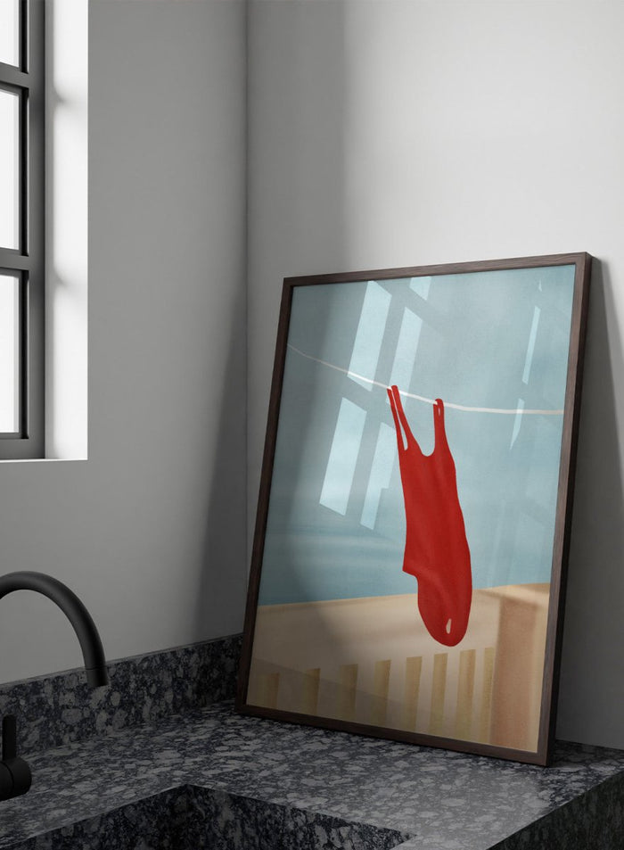 Red swimsuit hanging on a clothesline against a blue sky. Red Swimsuit On Balcony by Flow Line features a red swimsuit drying in the sun, bringing Mediterranean charm and summer vacation style to your walls.