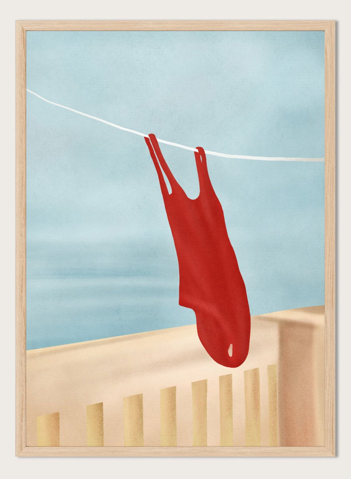 Red swimsuit hanging on a clothesline against a blue sky. Red Swimsuit On Balcony by Flow Line features a red swimsuit drying in the sun, bringing Mediterranean charm and summer vacation style to your walls.