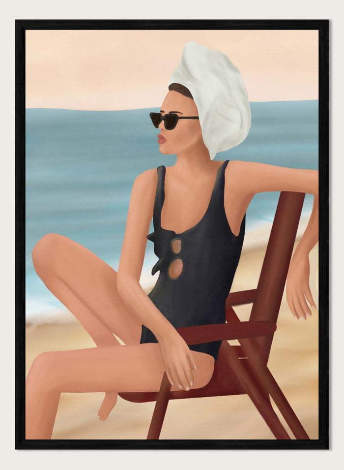 Woman in a black swimsuit with a towel on her head, sitting on a beach chair by the ocean. Relaxed Beach Style by Flow Line features a woman lounging by the sea in vintage swimwear, bringing coastal elegance and summer style to your walls.