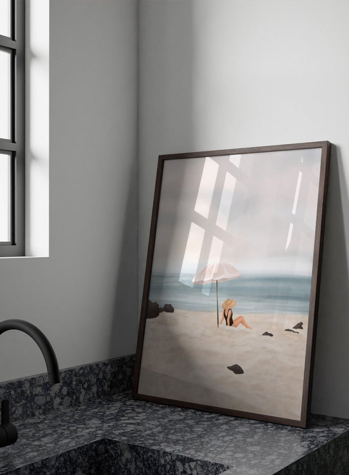 Woman under an umbrella on a beach with a calm ocean and sky. Serene Beach Scene by Flow Line is a coastal art print featuring a woman by the ocean, beach umbrella, seaside illustration, and summer wall art.