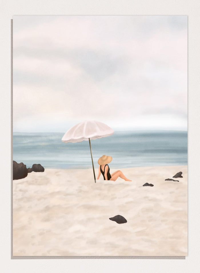 Woman under an umbrella on a beach with a calm ocean and sky. Serene Beach Scene by Flow Line is a coastal art print featuring a woman by the ocean, beach umbrella, seaside illustration, and summer wall art.