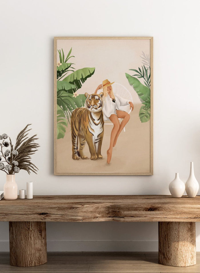 Illustration of a woman sitting next to a tiger with tropical plants in the background. Tropical Tiger Woman by Flow Line is a tropical art print featuring a woman, tiger, and lush greenery, perfect for boho, maximalist, and modern interiors.