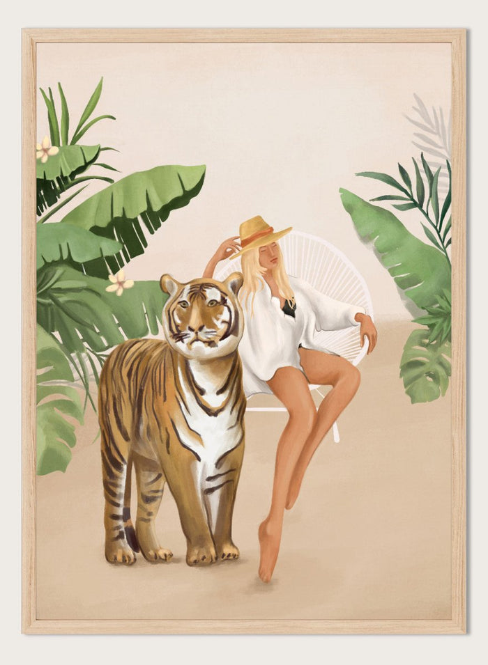 Illustration of a woman sitting next to a tiger with tropical plants in the background. Tropical Tiger Woman by Flow Line is a tropical art print featuring a woman, tiger, and lush greenery, perfect for boho, maximalist, and modern interiors.