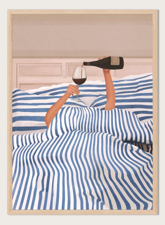 Person lying in bed pouring wine into a glass, wearing striped sheets. Wine In Bed by Flow Line is a playful art print featuring striped bedding, red wine, minimalist illustration, and cozy bedroom decor.