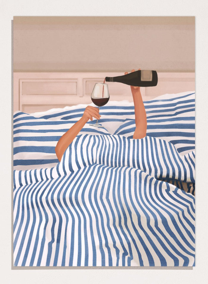 Person lying in bed pouring wine into a glass, wearing striped sheets. Wine In Bed by Flow Line is a playful art print featuring striped bedding, red wine, minimalist illustration, and cozy bedroom decor.