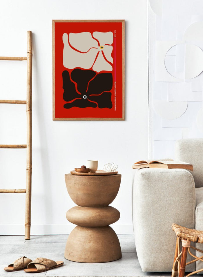 Abstract design with beige and black shapes on a red background. Two By Two Flower Red by Frances Collett is a modern abstract floral art print featuring two bold flowers in red, black, and cream tones. Officially licensed wall poster with optional framing.