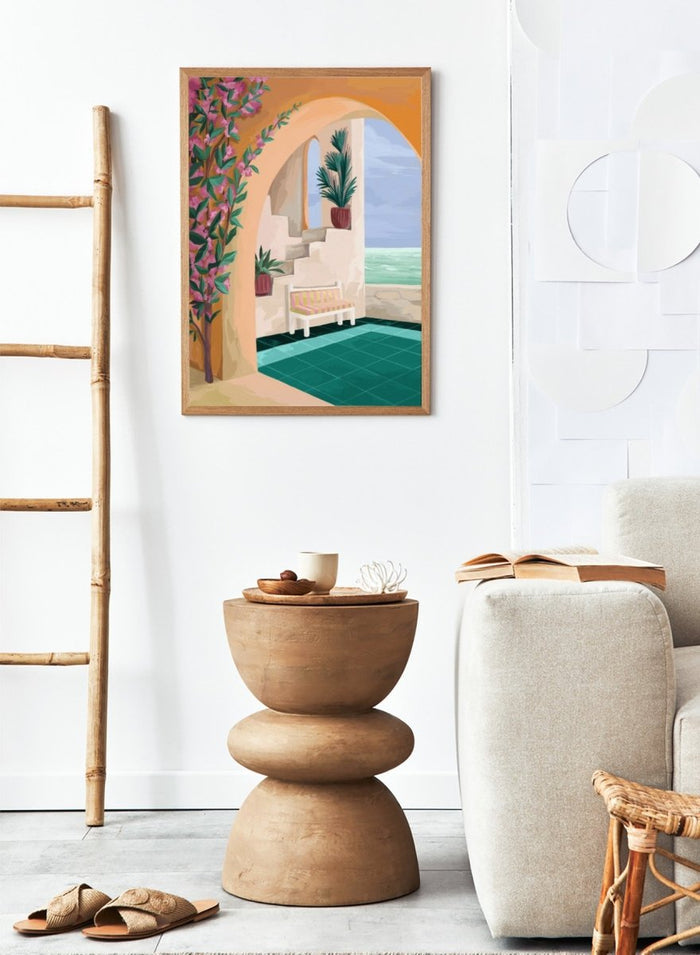Decorative interior scene with an arch, bench, and ocean view. Bench with a View by Goed Blauw is a coastal art print and wall poster featuring an arched terrace, striped bench, and ocean view with warm tones.
