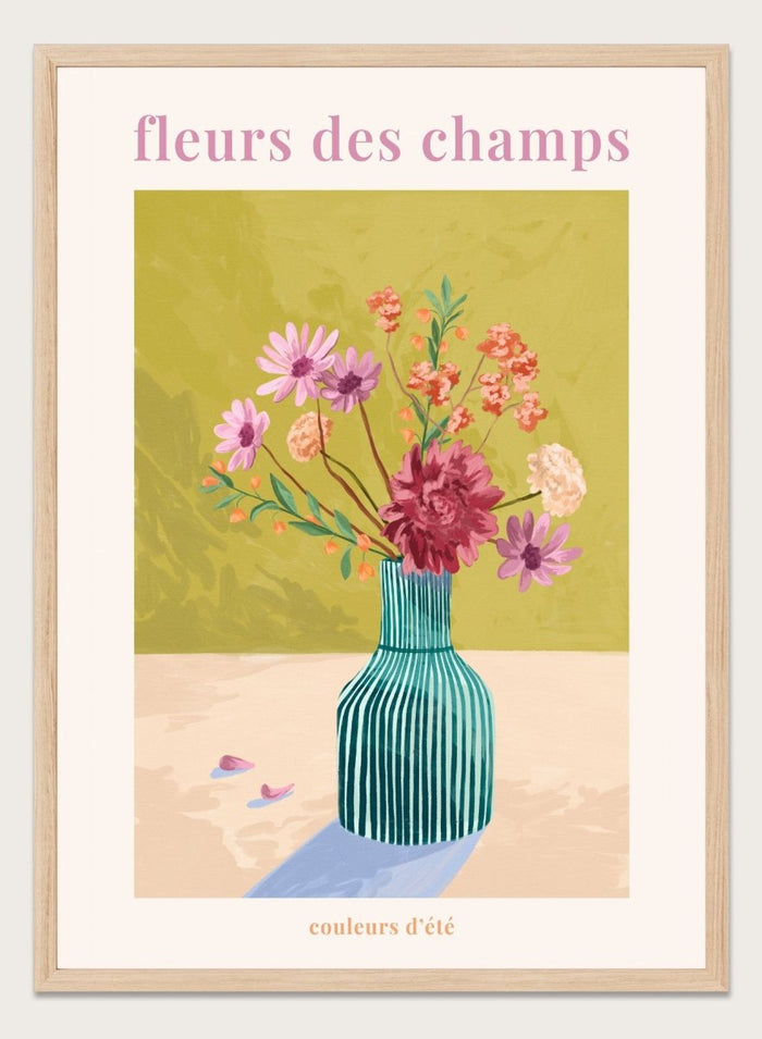 Illustration of a vase with flowers on a green background, featuring the text 'fleurs des champs' and 'couleurs d'ete'. Fleur Des Champs Green by Goed Blauw is a colorful floral art print and wall poster featuring a striped vase with loose flowers on a warm yellow background.