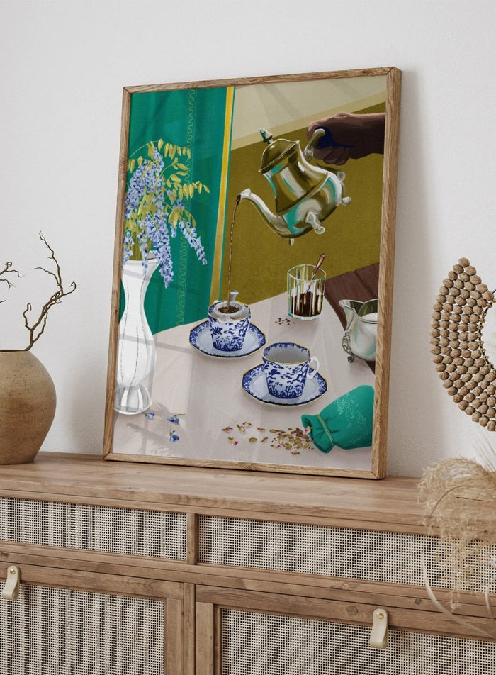 Tea being poured from a teapot into a cup on a table with a vase of flowers and a glass. I Despise English Tea by Goed Blauw is a still life art print and wall poster featuring tea being poured into patterned cups with bold green and gold tones.