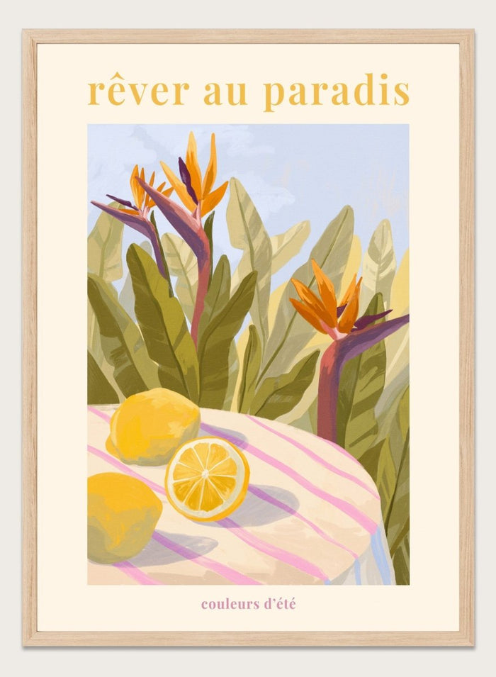 Illustration of tropical flowers and lemons with 'rêver au paradis' text on a light background. Rêver Au Paradis Lemon by Goed Blauw is a summer art print and wall poster featuring lemons, tropical leaves, and bird of paradise flowers in warm, vibrant tones.