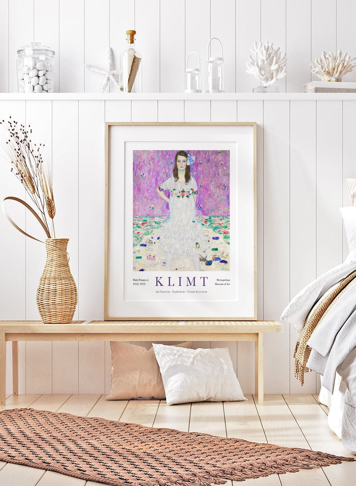 Gustav Klimt painted Mäda Primavesi exactly as she appeared to him. A girl who stood with total confidence, hands on hips, completely sure of who she was. The bright lilac backdrop and scattered florals make the whole portrait feel full of life, but it’s her expression that pulls you in.

This is the kind of art print that quietly lifts you. Every time you walk past it, you feel a little braver, a little lighter, and a little more like the version of yourself who doesn’t shrink from anything.