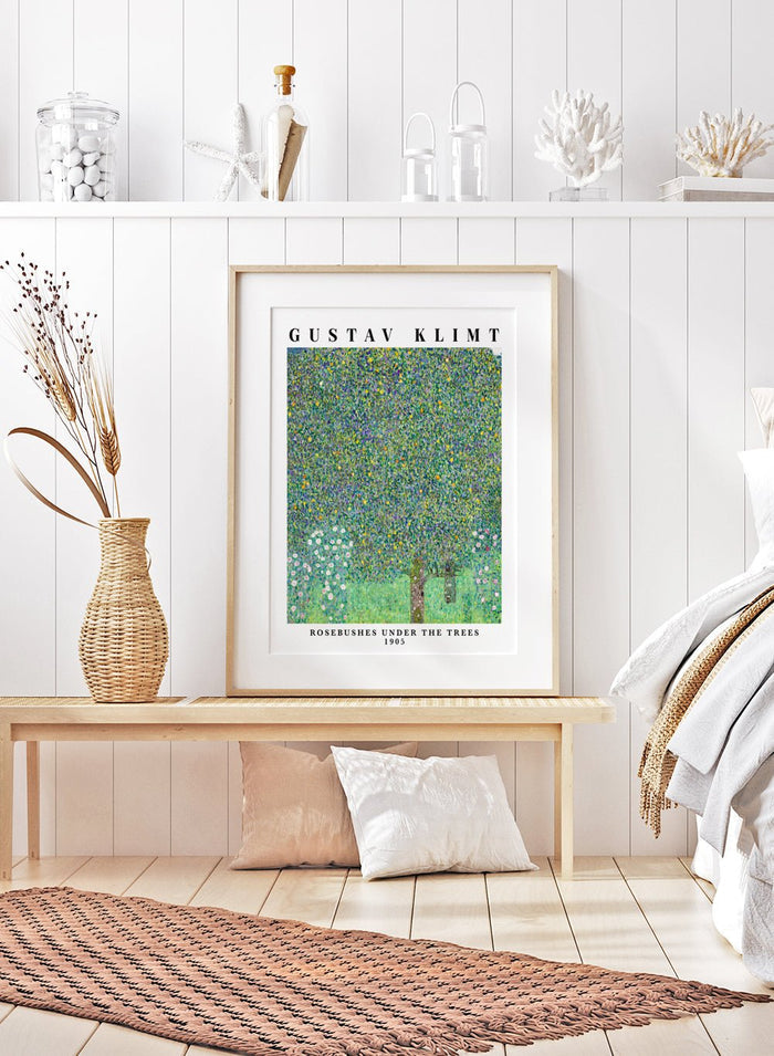 Rosebushes Under the Trees art print by Gustav Klimt is one of those paintings that feels like a memory. Klimt created it while spending summers by Lake Attersee, where he let go of heavy symbolism and focused on the beauty of everyday nature. The leaves turn into a mosaic of greens and yellows, almost buzzing with life, while the small rosebushes ground everything with a soft, gentle sweetness.