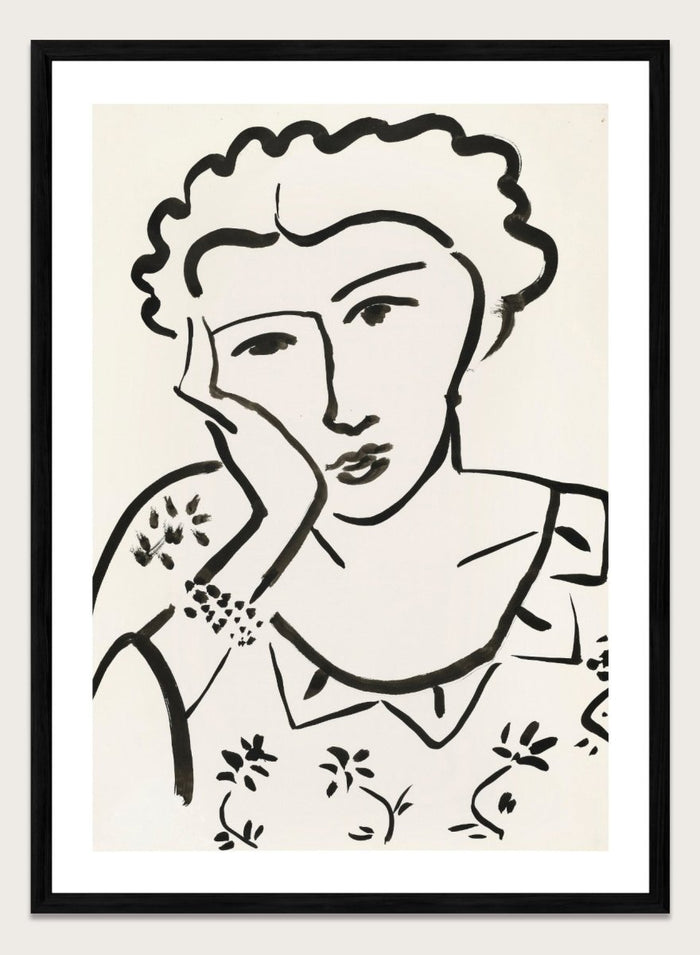 Black line art of a woman with floral patterns on a white background. Jeune Fille Accoudée by Henri Matisse is a minimalist portrait art print featuring expressive black linework, floral detailing, and refined French modernist design.