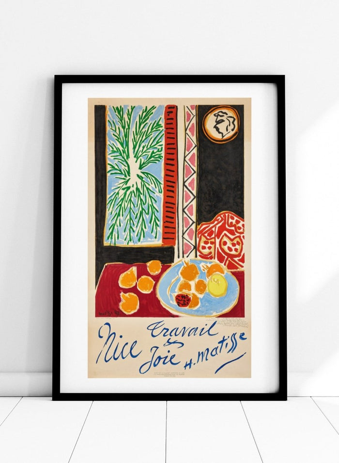 Colorful artwork with a table setting, oranges, and abstract elements on a beige background. Nice, Travail et Joie by Henri Matisse is a colorful 1947 art print featuring Mediterranean interiors, expressive linework, fruit still life details, and modern French design.