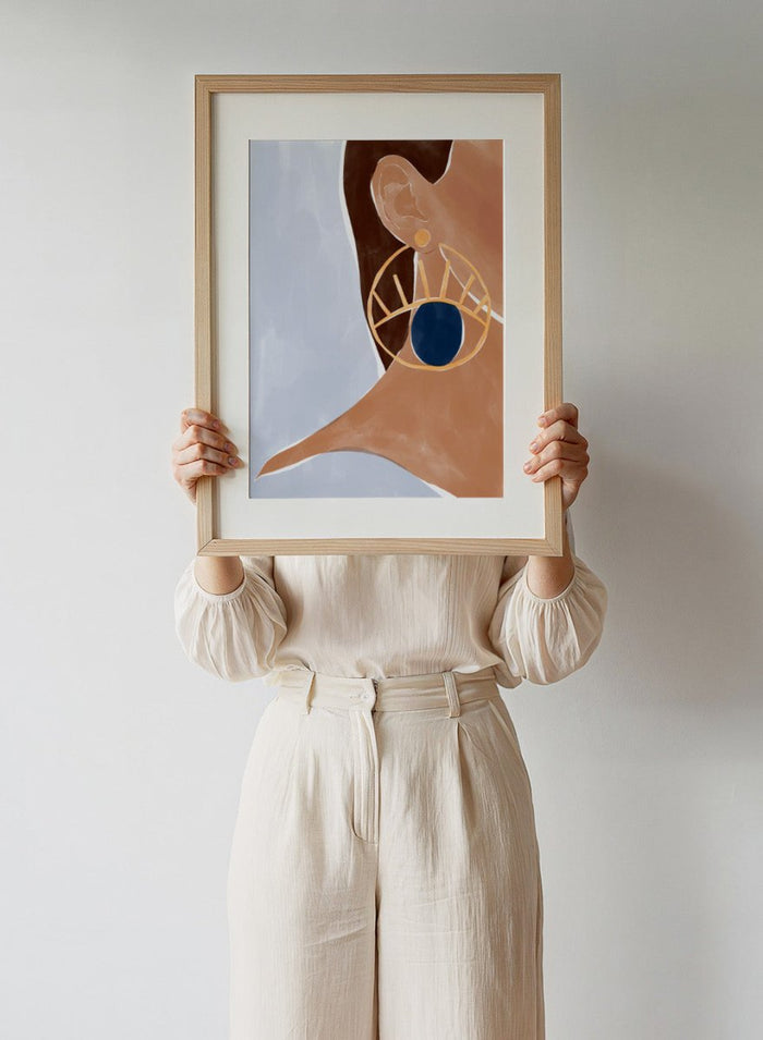 Evil Eye Earring by Ivy Green is a modern illustration art print featuring a bold evil eye earring and minimalist portrait style. Premium fine art print with optional wood framing.