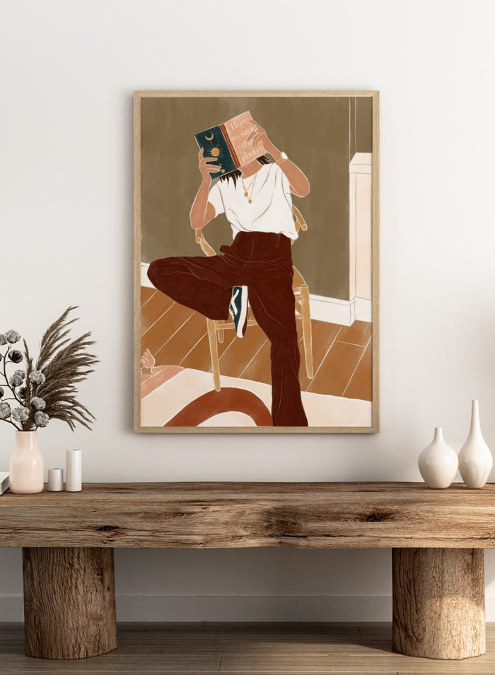 How To Save the Planet by Ivy Green is a modern lifestyle art print featuring a woman reading in a cozy interior. Premium fine art print with optional wood framing.