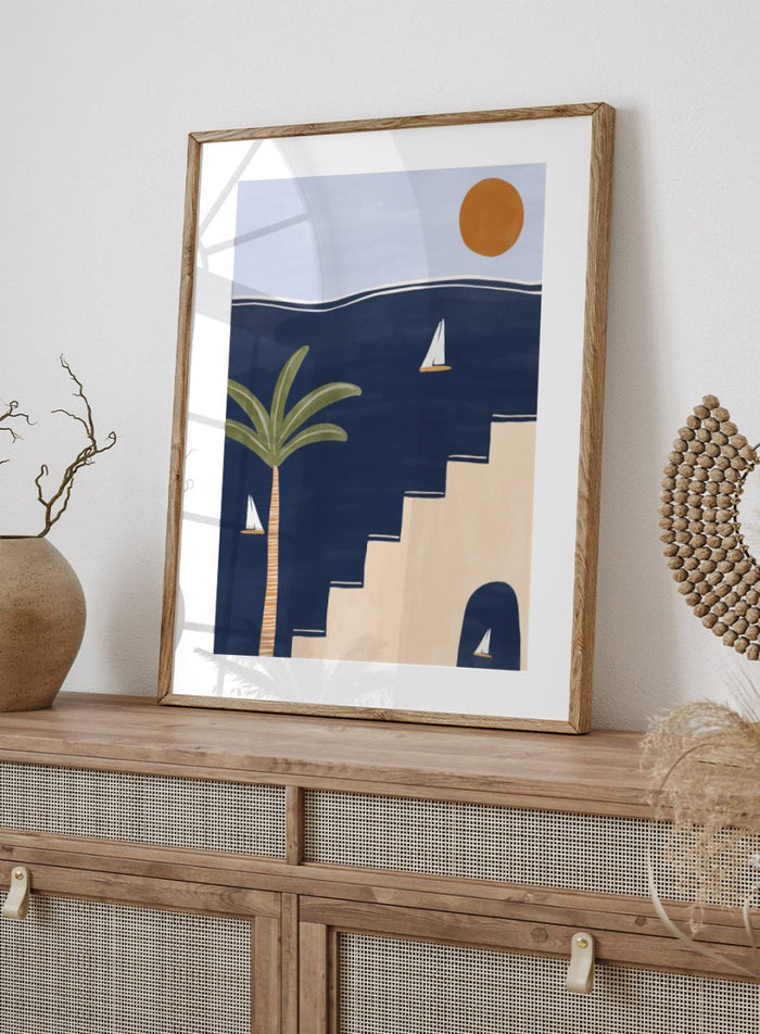 Sailboats by Ivy Green is a modern coastal art print featuring sailboats on deep blue water with palm trees and sun. Premium fine art print with optional wood framing.