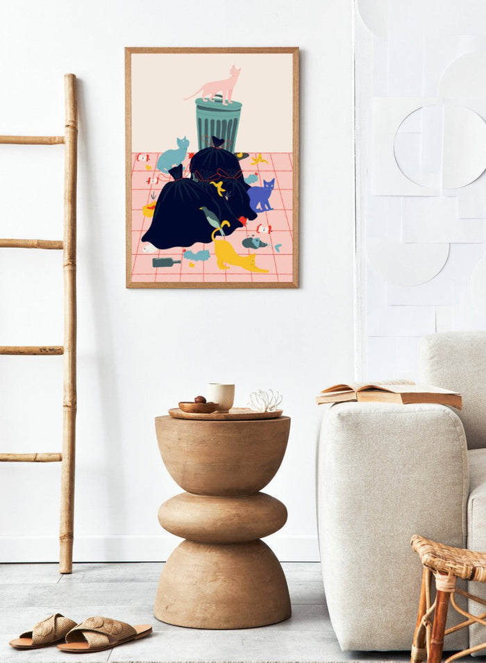 Illustration of a trash can and cats on a pink grid background. Cats by Jota de Jai is a funny modern wall art print featuring colorful cats taking over a messy room. Officially licensed fine art poster with optional wood frame.