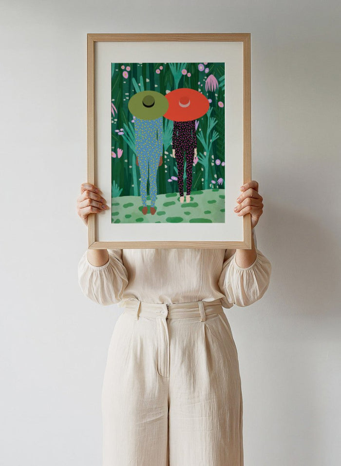 Two people with large hats walking through a lush, colorful forest. Jungle Pajamas by Jota de Jai is an officially licensed fine art wall poster about friendship and quiet connection, available framed or unframed.