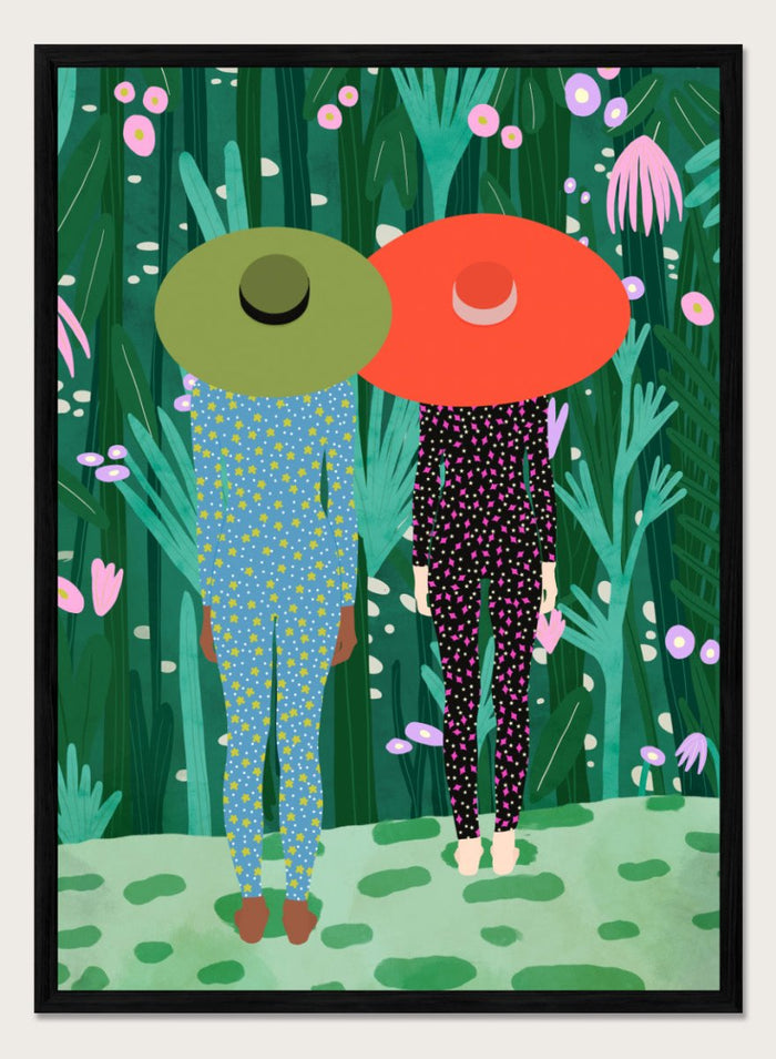 Two people with large hats walking through a lush, colorful forest. Jungle Pajamas by Jota de Jai is an officially licensed fine art wall poster about friendship and quiet connection, available framed or unframed.