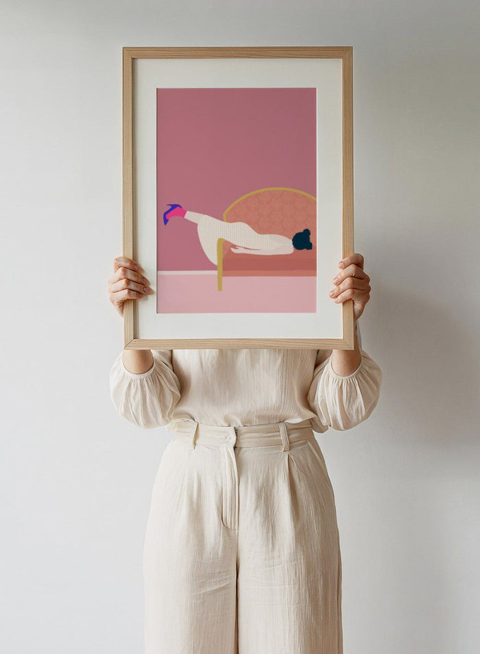 Illustration of a person lying on a sofa with a pink background. Maddie’s Mood by Jota De Jai is a playful contemporary art print of a woman lounging on a vintage sofa in a bold pink room. Officially licensed wall poster with framing.