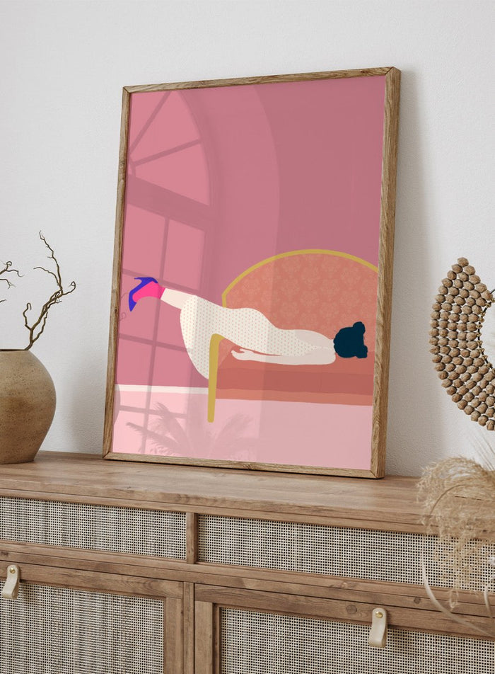Illustration of a person lying on a sofa with a pink background. Maddie’s Mood by Jota De Jai is a playful contemporary art print of a woman lounging on a vintage sofa in a bold pink room. Officially licensed wall poster with framing.