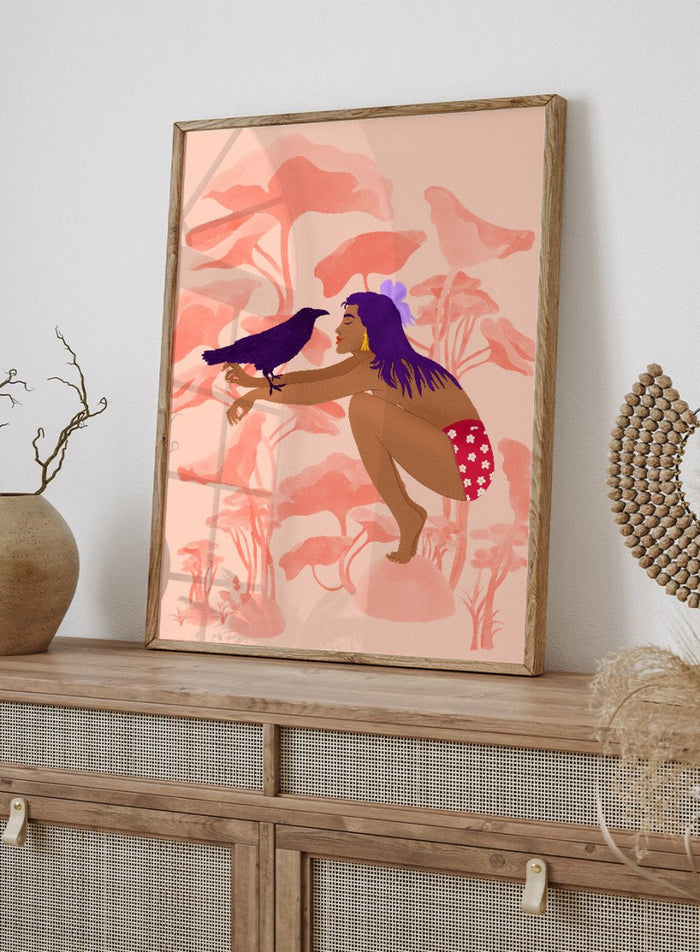 Illustration of a woman with a bird on a pink floral background. Raven by Jota de Jai is a modern pink wall art print of a woman with a purple raven, available as a premium fine art poster with optional wood framing.