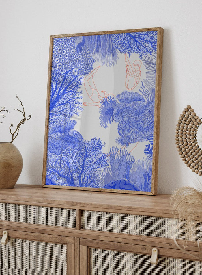 Illustration of people climbing on coral with blue and white patterns. Underwater by Jota de Jai is a modern blue wall art print of swimmers drifting through an ocean coral illustration, available as a premium fine art poster with optional wood framing.