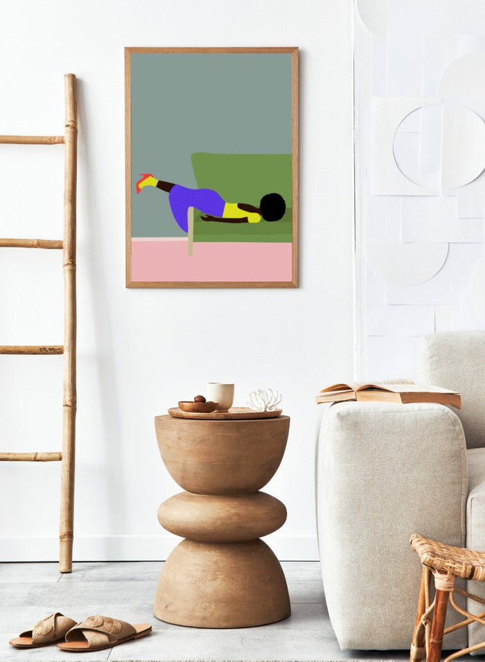 Simplified illustration of a person lying on a green couch with a gray wall and pink floor. Wendy’s Mood by Jota de Jai is a modern art print of a woman lounging dramatically on a green couch, officially licensed wall poster with fine art printing and framing.